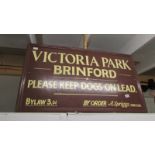 A wooden sign 'Victoria Park Brinsford' Collect only.