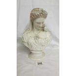 A 19th century bust of a female with a dove on her shoulder, 26 cm tall. Collect only.