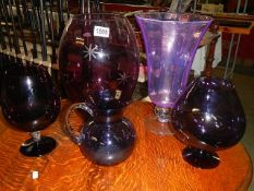 Five pieces of purple glass. Collect only.