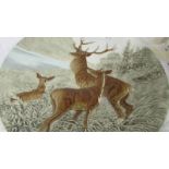 A large ceramic charger depicting stag and deer marked Schutz Blansko (rim chips). Collect only.