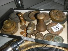 A quantity of brass weights.