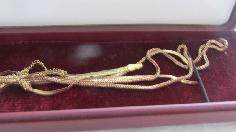 Three 9ct gold neck chains and a 9ct gold bracelet, 5.3 grams. - Image 3 of 3