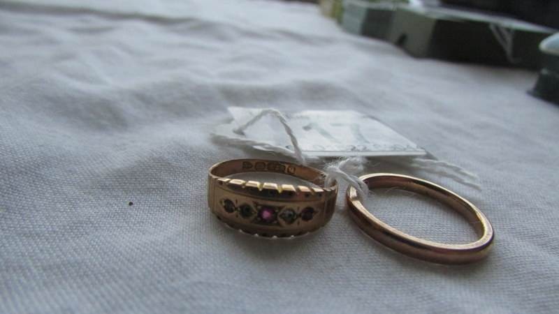 A 9ct gold wedding ring, size L and an early 20th century ring (missing one stone), size J half. - Image 2 of 3