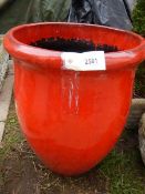 A large glazed terracotta red plant pot. 28 x 59 cm. Collect only.