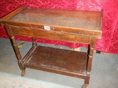 A fold over oak trolley. Collect only.