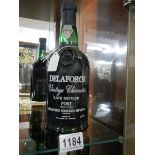 A bottle of Delaforce vintage character late bottled port, label number 891996.