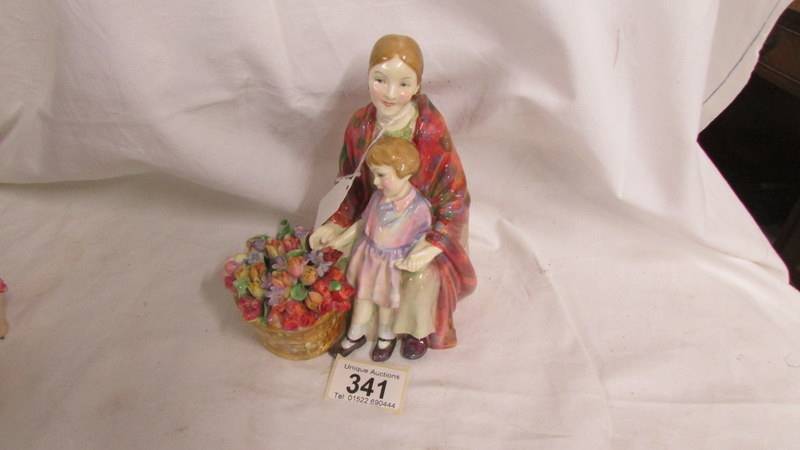 A Royal Doulton figurine, Blossom, HN 1667. Some rubbing to glaze at bottom of rear cloak. No