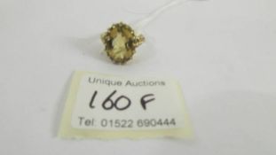 A 9ct gold ring set large citrine, size N.
