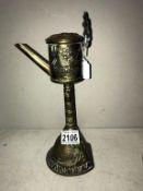A 19th century brass whale oil lamp
