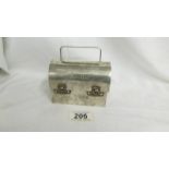 A Cartier sterling silver handbag in the form of a trunk, mid century, with Vanessa monogram, signed