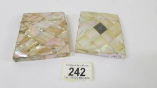 Two mother of pearl card cases.