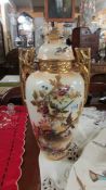 A hand painted lidded vase depicting birds, a/f.