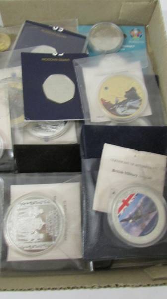 A quantity of collector's coins including at least one 999 silver coin. - Image 2 of 3