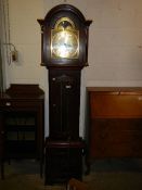 A Brass dial three weight long case clock.