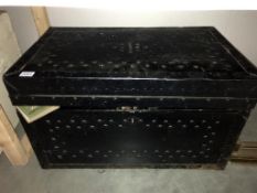 A large antique studded travel trunk. Collect only.