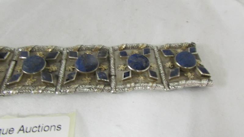 An art deco bracelet in silver set with Lapiz Lazuli and gilded accents. - Image 2 of 3