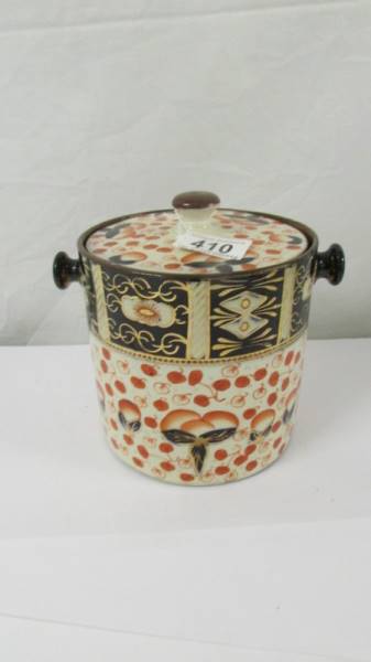 A Mason's Ironstone style biscuit barrel (missing handle).