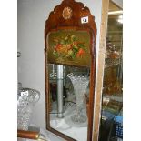 A Regency design walnut framed mirror with hand painted floral decoration. Collect only.