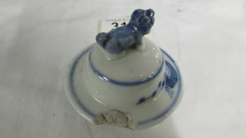 A pair of early Chinese blue and white lidded vases (both lids a/f) and a blue and white flask. - Image 3 of 25