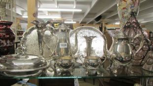 A four piece silver plate tea set, 2 trays, a tureen and 2 vases. Collect only.