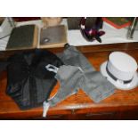 A child's three piece riding suit and hat, in good condition.