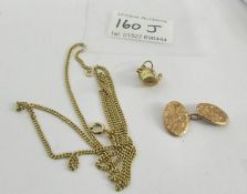 A 9ct gold chain, a gold cuff link and a gold kettle charm, 8.5 grams.