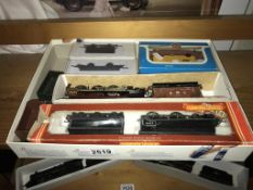 2 boxed trains. Duke of Sutherland (5541) and Loco 62700 plus 5 pieces of rolling stock