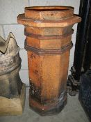 A large terracotta hexagonal chimney pot, 80 cm tall.