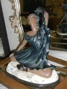 An art deco style figure of a lady on marble base. Collect only.