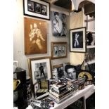 A large collection of Elvis memorabilia including Clock, lamp, pictures, mugs, shower curtain, cd's,