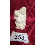 An antique carved ivory Buddha, circa 19th century. Available for UK shipping only.