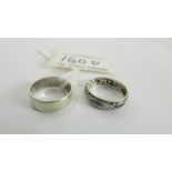 A 9ct gold wedding ring and an unmarked eternity ring, size N.