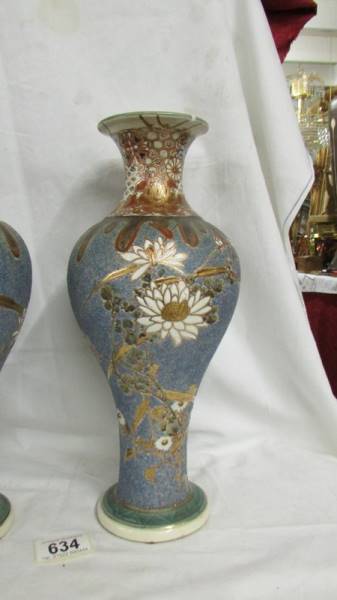 A pair of vases 13" high with mostly blue textures background on which is a lovely decoration of - Image 2 of 4