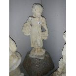 A garden figure of a girl on stand a/f (repair to head).