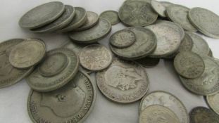 Approximately 300 grams of pre 1947 silver coins.