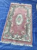 A rectangle rug, pink & green (150cm x 91cm)