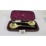 A cased pair of circa 1883 silver apostle spoons.