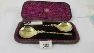A cased pair of circa 1883 silver apostle spoons.