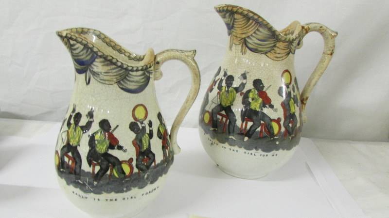 Two rare early 20th-century jugs depicting jazz bands, both a/f.