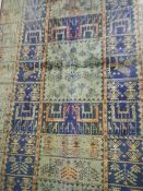A Belgian silk runner in a blue/green 'Middle Eastern' floral pattern. 205 x 69 cm.