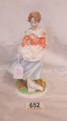 A Royal Worcester Old Country Ways series figurine 'A Farmer's Wife', 675/9500.