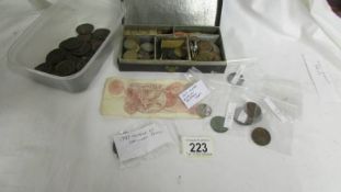 A mixed lot of coins including a small amount of pre 1947 silver.