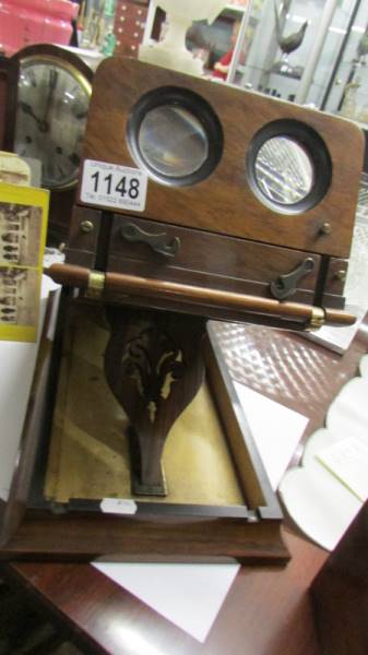 A good Victorian stereoscopic viewer marked with Crown Treasury, complete with box of cards. in - Image 3 of 33