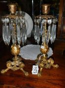 A pair of Victorian Rococo style candlesticks with glass droppers. a/f.