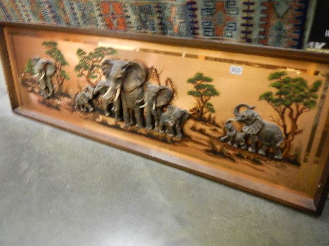 A large copper 3D plaque depicting elephants. 157 x 50 cm. (some tusks loose.)