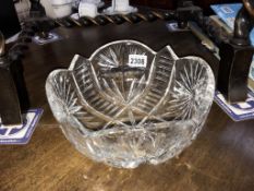 A very heavy cut glass bowl