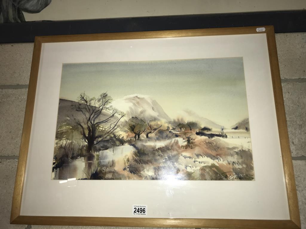 A framed and glazed Watercolour of a Winter mountain landscape signed by Sal Bua