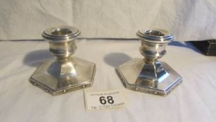 A pair of Turner Simpson silver candlesticks.