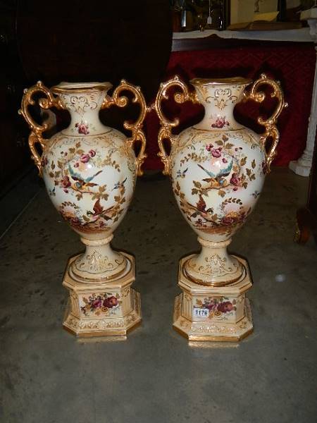 A pair of Staffordshire vases, missing lids but in good condition, 64 cm tall.