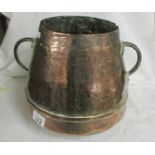 A large antique copper two handled pot. Collect only.